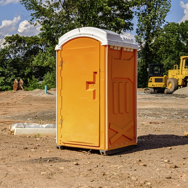 how often are the portable restrooms cleaned and serviced during a rental period in Corn Creek